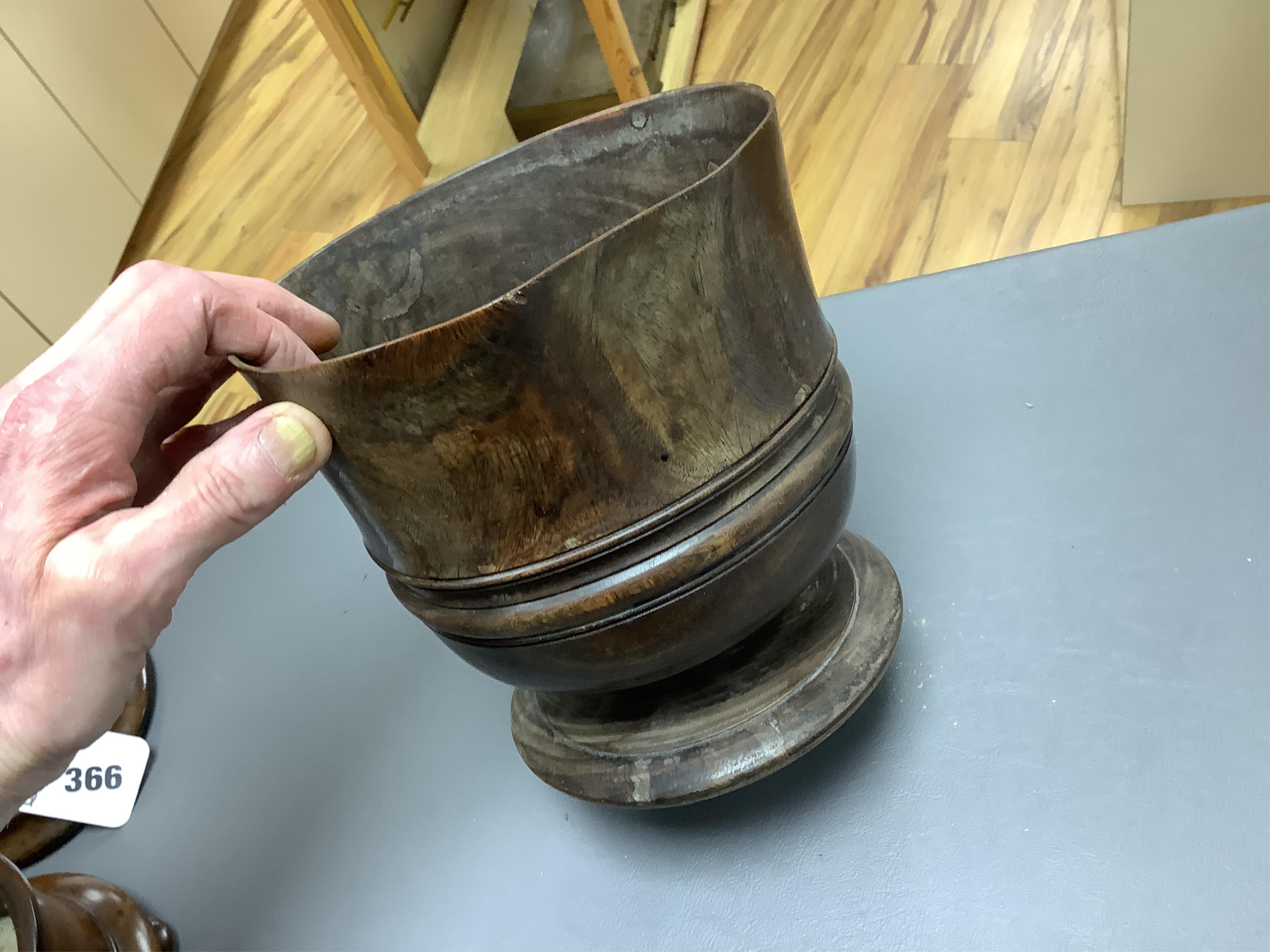 An 18th/19th century lignum vitae wassail bowl and a circular mahogany tobacco box, largest 18cm high